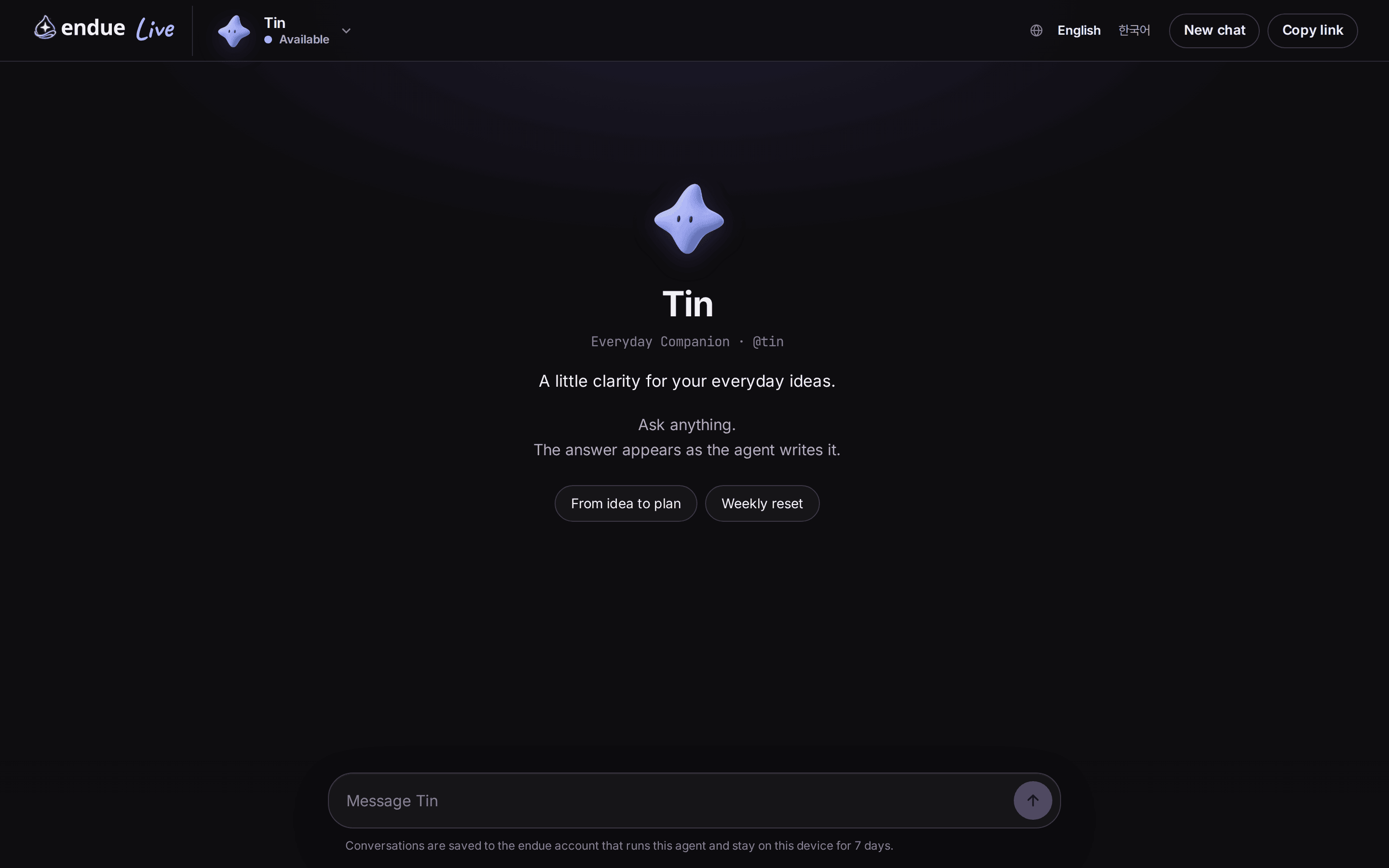 The first screen of endue.live/@tin. Tin’s character and name sit in the center with “Everyday Companion · @tin” and a one-line intro, followed by two starter buttons, “From idea to plan” and “Weekly reset”. A “Message Tin” box is at the bottom.